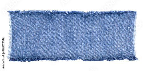 Valokuva jeans. a frayed and torn piece of denim rag.