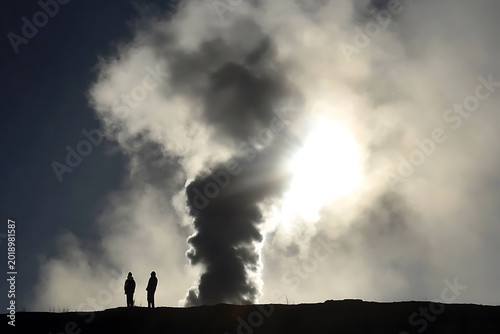 geysers shooting steam into firmament at Yellowstone