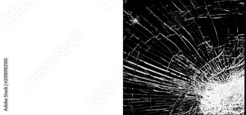 Tableau sur toile Closeup of a shattered glass surface with cracks and breakage on black backgroun