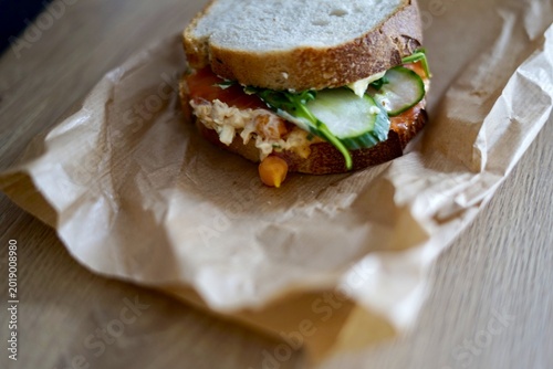 Casual Fish Sandwich. Simple Open Sandwich Featuring Smoked Salmon And Crisp Vegetables On Wholegrain