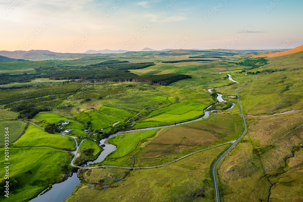 Naklejka premium Aerial sunset view over the Erriff River valley north of Killary Fjord, County Mayo, Ireland. Remote Wild Atlantic Way landscape near Leenane and Aasleagh Falls.