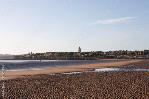 Wide flat West Sands beach on sunny evening, St Andrews, Scotland