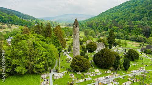 Foto Aerial view of ancient cemetery and round tower at Glendalough Monastic Site in County Wicklow, Ireland