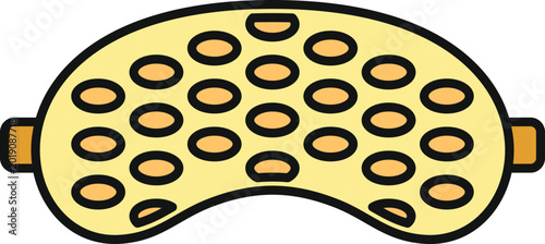 Photos Yellow sleeping mask with a dotted pattern for better sleep and comfort