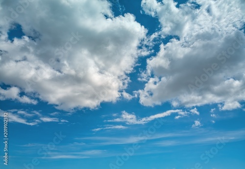 spanning from high-altitude textures and fair-weather cumulus clouds to heavy, dramatic storm layers and the vibrant, pastel light of the golden hour.