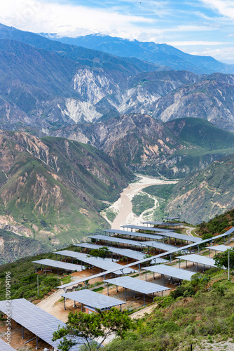 Renewable energy in a mountainous landscape with panoramic natural views.