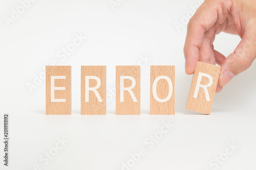 Modern technology concept of Error on wood blocks. Digital innovation and connectivity visualization.