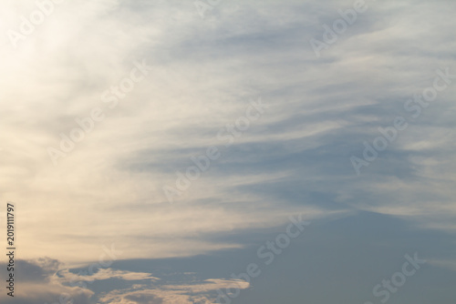 Tableau sur toile Peaceful blue sky filled with layered white clouds and soft daylight tones, creating a clean natural atmosphere ideal for backgrounds and outdoor concepts