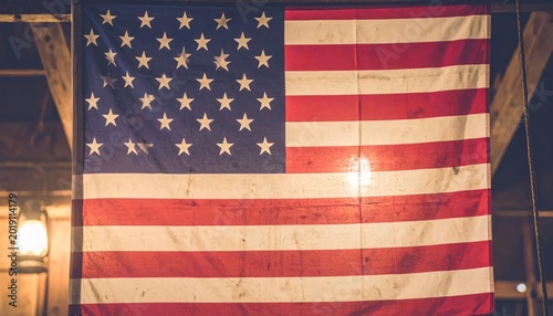 American Flag Hanging on Building Exterior.