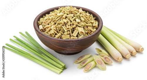 Fresh Lemongrass Stalks and Chopped Lemongrass in a Wooden Bowl.