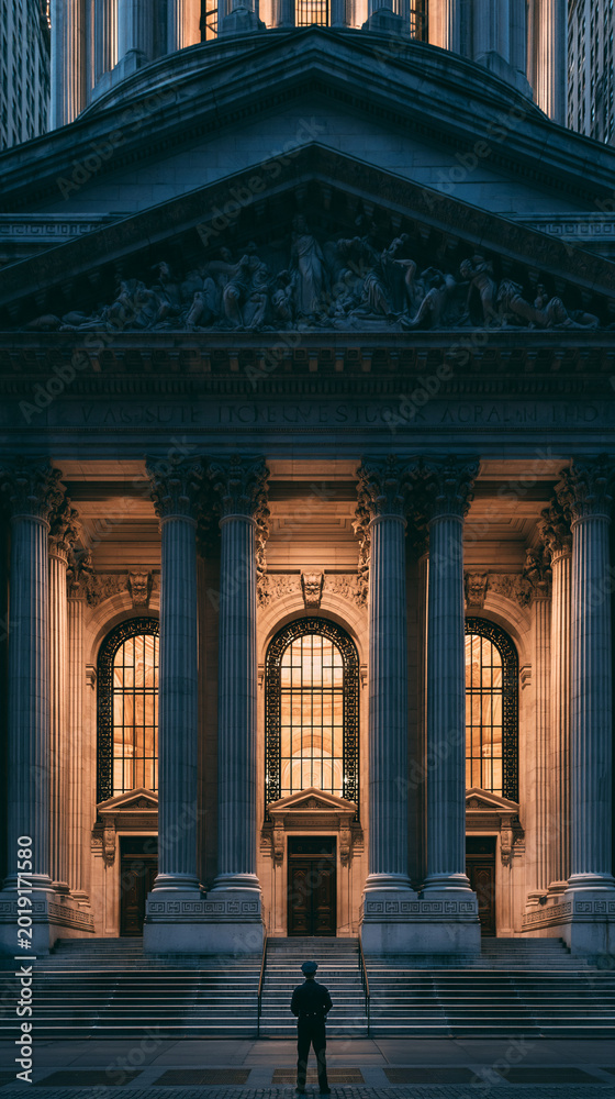 Fototapeta premium Historic Granite Building with Columns: Nighttime Symmetry, Silhouette, Urban Cityscape Exploration in Gorgeous Monumental Landmarks Photography