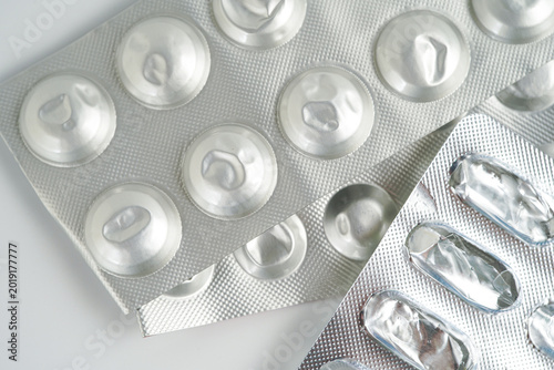Blisterpack of capsule pills medical capsules pills Metallic blister packs of used medication