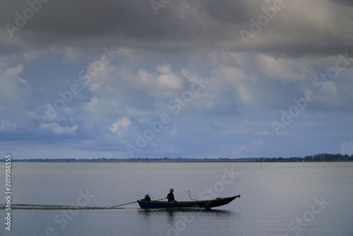 Photos Wooden canoes used on Asian rivers, lakes and water channels for transportation