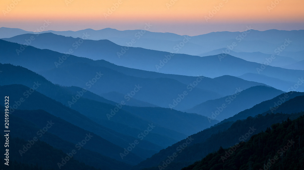 Fototapeta premium Sunrise over the Great Smoky Mountains in Tennessee, Blue Ridge mountain landscape concept, with copy space