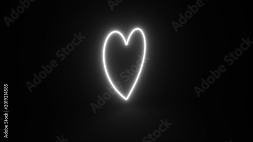 White Heart, Symbol of Love and Valentine's Day Glowing and Rotating on Black Background