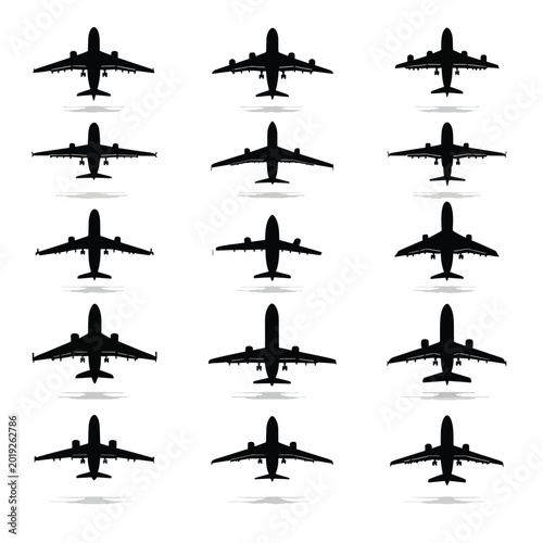 Collection of airplane silhouettes flying high.