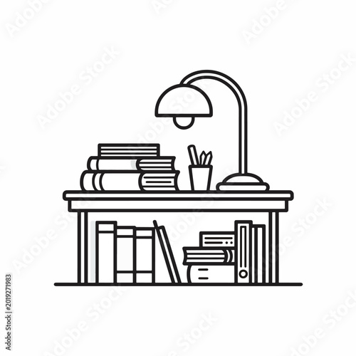 Desk with books and a lamp.