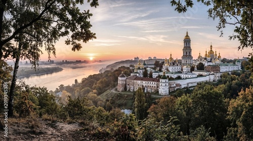 Historic Monastery Complex at Sunrise with River View