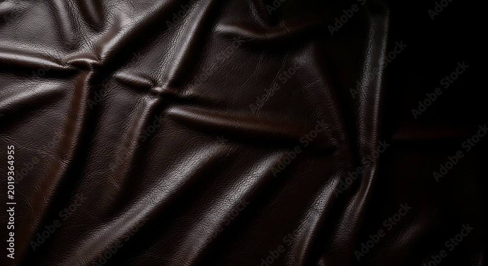 Fototapeta premium Dark brown leather texture background with soft folds and natural grain