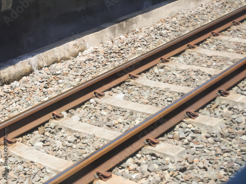 Photos Closeup of straight rusty train tracks