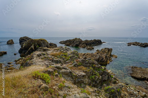 Schilderij op canvas Rocky headland and calm sea on the French coastline