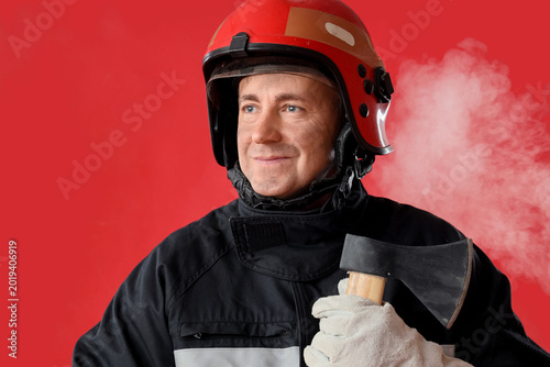 Happy mature male firefight...