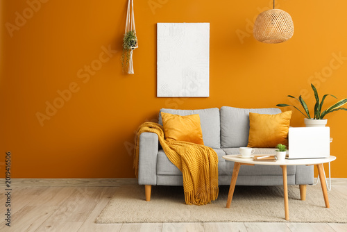 Comfortable sofa and table ...