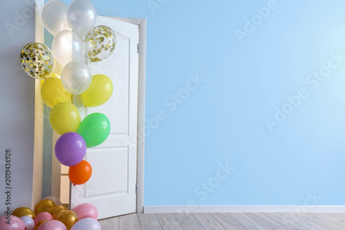 Many colorful balloons near...