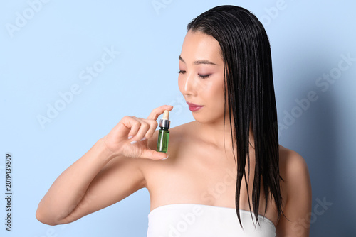 Beautiful Asian woman with ...
