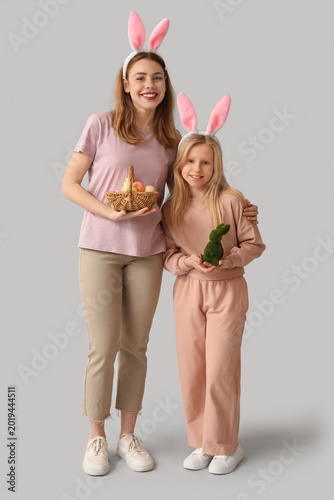 Cute little girl with rabbi...