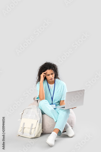 Stressed female African-Ame...