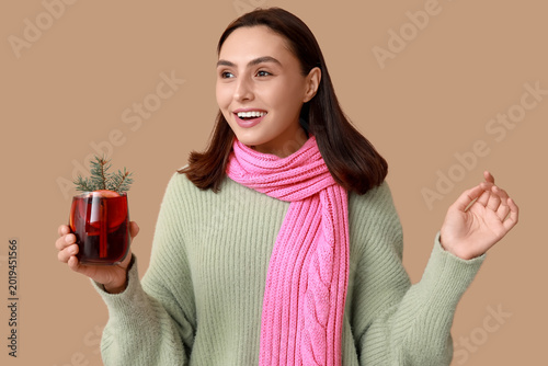 Happy young woman in scarf ...