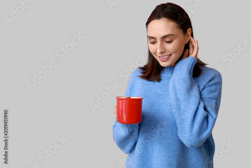 Beautiful young woman with ...