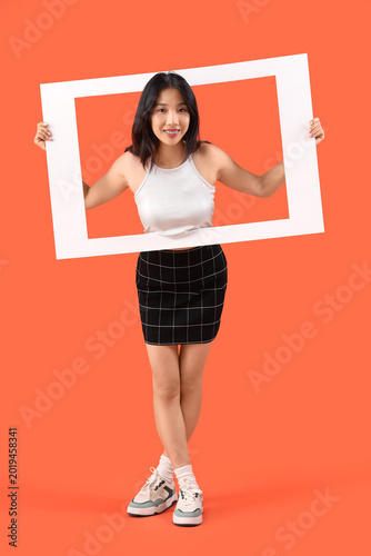Young beautiful Asian woman...