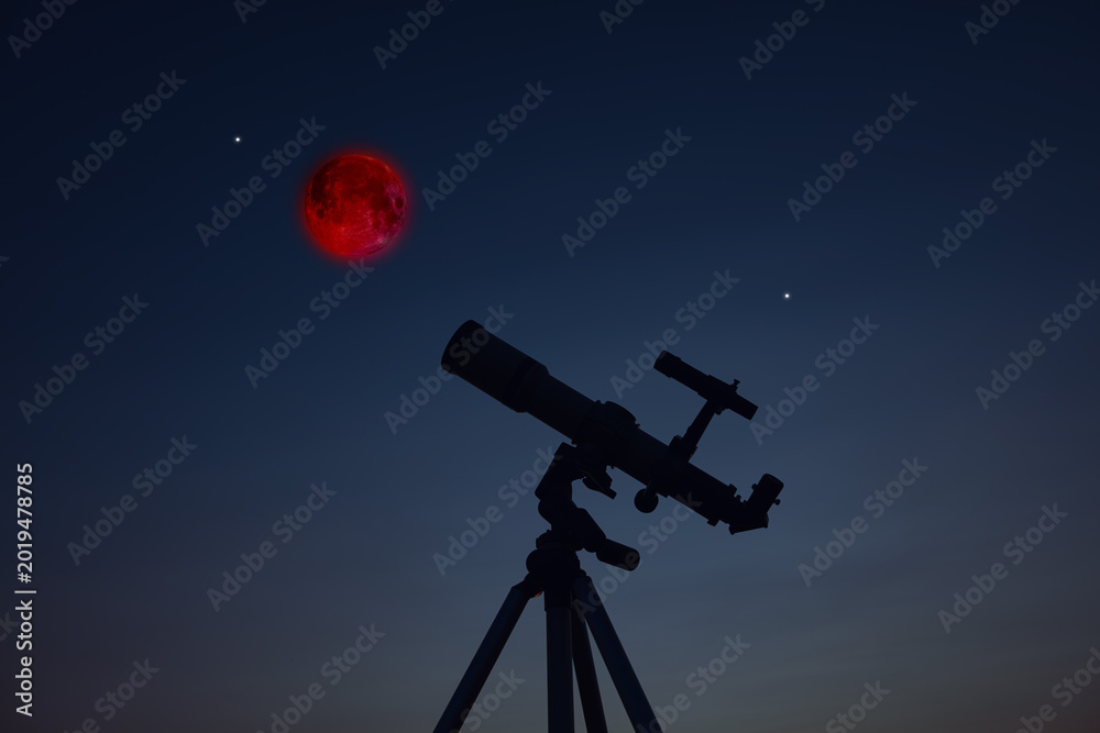Fototapeta premium Astronomy telescope for observing Lunar eclipse, stars, planets and other celestial Milky Way objects.