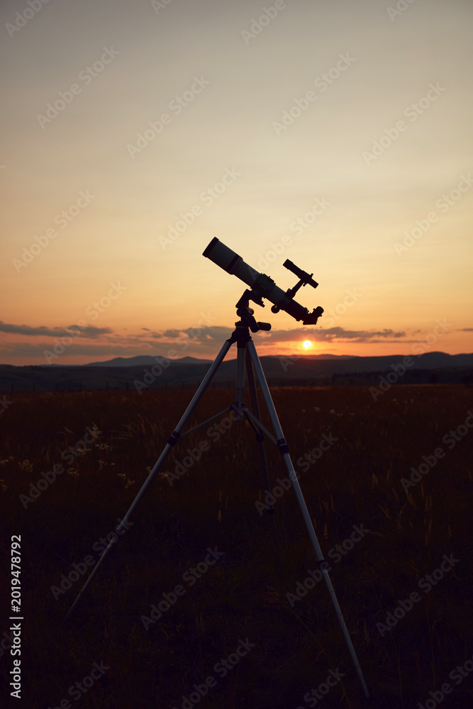 Fototapeta premium Amateur astronomy telescope for observing stars, planets, Milky Way, Moon and other celestial objects.