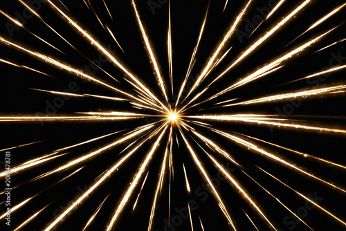 Golden light streaks radiating from a central bright starburst on a black background