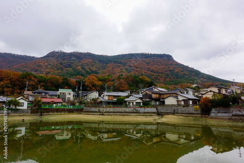 Quadro em tela Quiet rural village beneath autumn mountains along the Shikoku Henro pilgrimage