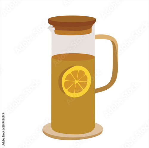 lemon juice in a pitcher. Lemonade in a glass jug with lemon slices. 
