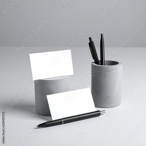 A simple still life of office supplies on a white surface