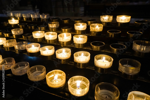 Canvas Print Burning candles in Cologne Cathedral, Germany
