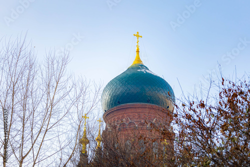 Photography The iconic Saint Sophia Cathedral with colorful domes and red architecture in Harbin, China