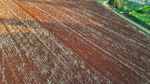 Billede på lærred Aerial View of Cultivated Red Soil Farmland in Nakhon Ratchasima Thailand