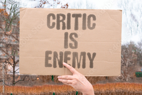 фотографія "Critic Is Enemy" Governments brand policy critics as enemies to avoid responding to their concerns