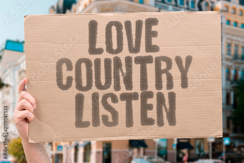Cuadro en lienzo "Love Country Listen" Real patriotism includes listening to uncomfortable national truths