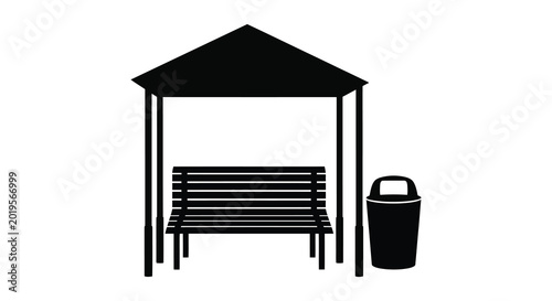 Fotografía park gazebo with bench and trash can silhouette