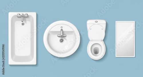 Foto Clean white bathroom fixtures including bathtub sink toilet and mirror