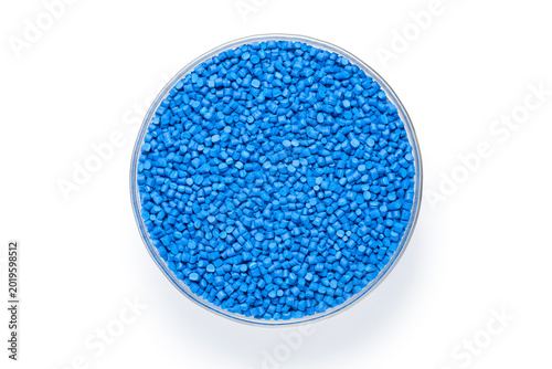 Canvastavla Blue masterbatch granules in a glass bowl isolate on white background