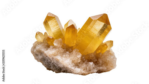 Fotografie Cluster of golden yellow quartz crystals on rough rock, isolated on transparent