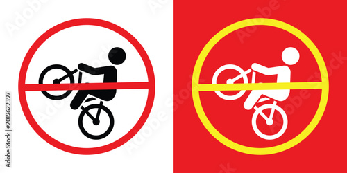 Tableau sur toile Prohibitory sign set depicting a person performing a wheelie on a bicycle